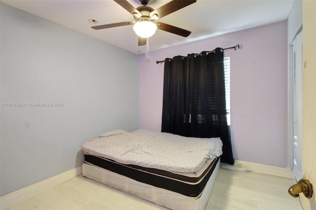 bedroom featuring ceiling fan