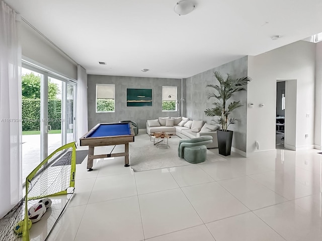 playroom with light tile patterned flooring and pool table