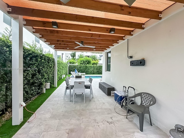 view of patio with ceiling fan