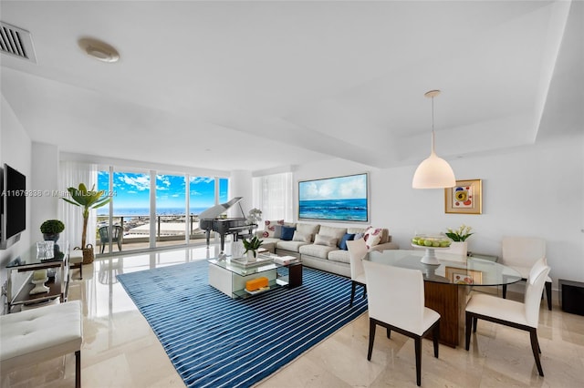 living room featuring a water view