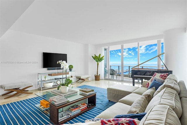 living room with hardwood / wood-style floors and expansive windows