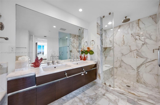 bathroom with vanity and an enclosed shower