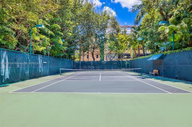 view of sport court featuring basketball hoop