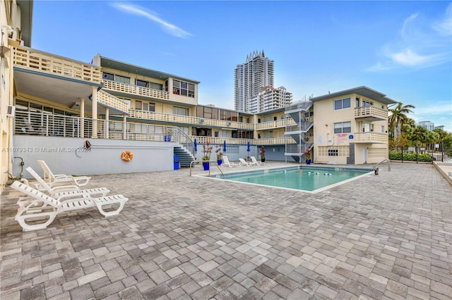 view of pool with a patio area