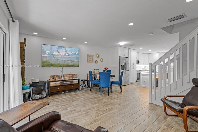 living room featuring light hardwood / wood-style floors