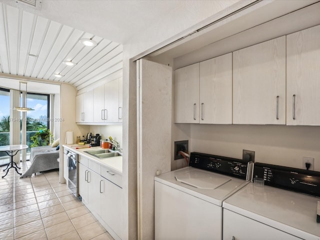 2800 Island Blvd Unit 702, Aventura, FL 33160 - laundry room with a sink, washer and clothes dryer, and light tile patterned flooring