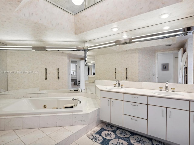 2800 Island Blvd Unit 702, Aventura, FL 33160 - bathroom featuring a whirlpool tub, tile patterned flooring, double vanity, and recessed lighting