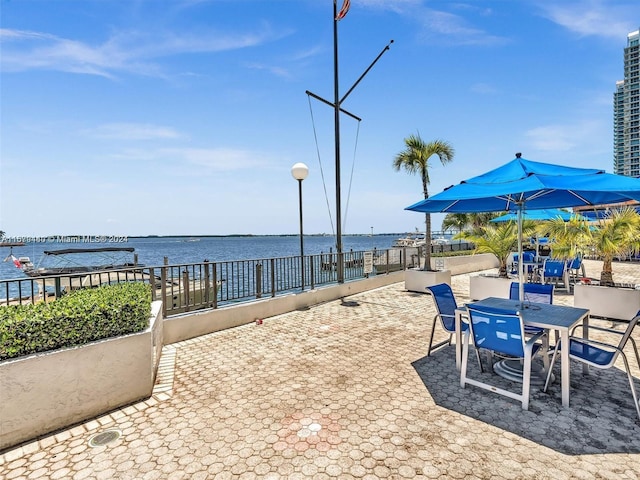 view of patio / terrace with a water view