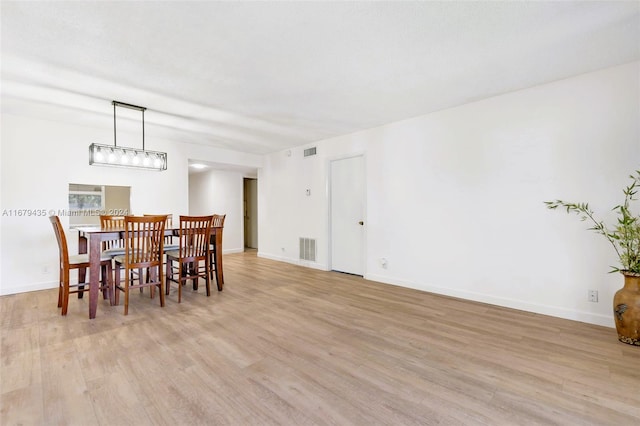 dining room featuring light wood-type flooring