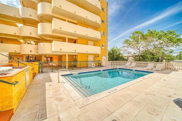 view of pool with a patio area