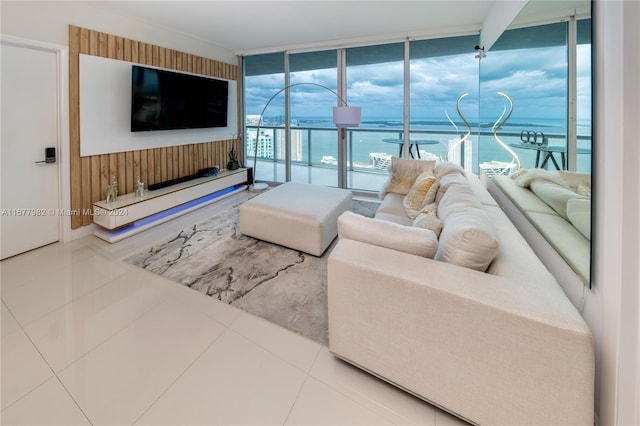 tiled living room with floor to ceiling windows