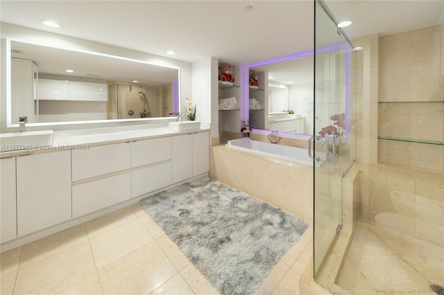 bathroom with vanity, separate shower and tub, and tile patterned floors