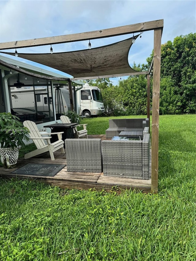 view of patio with an outdoor living space and a deck