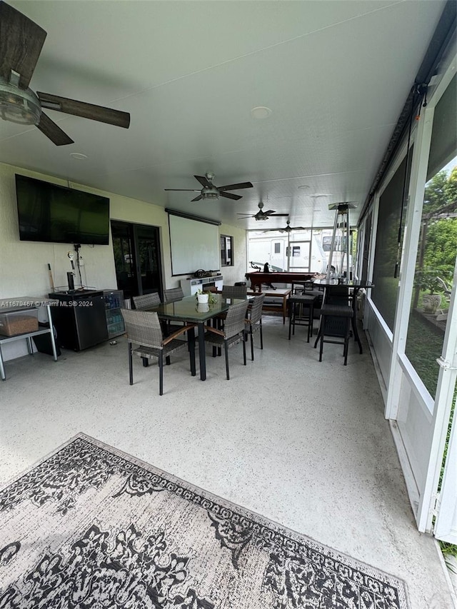 interior space featuring ceiling fan