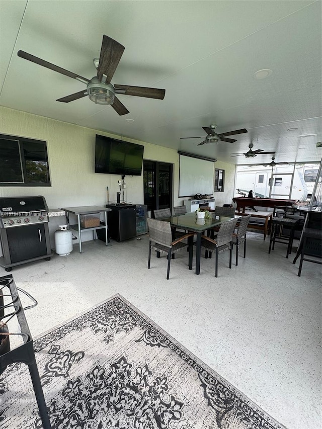 dining room featuring ceiling fan