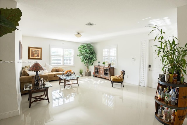 sitting room with light tile patterned floors