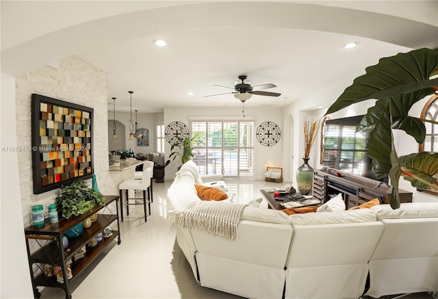 living room featuring ceiling fan