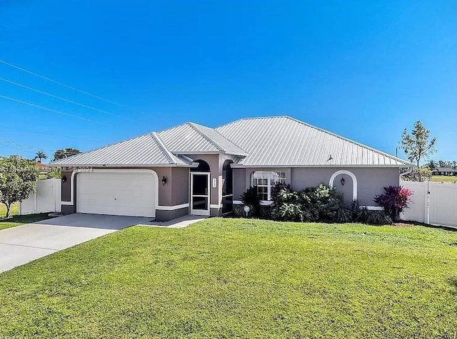 single story home with a front yard and a garage