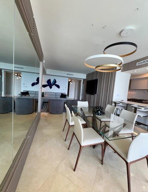 dining room featuring an inviting chandelier