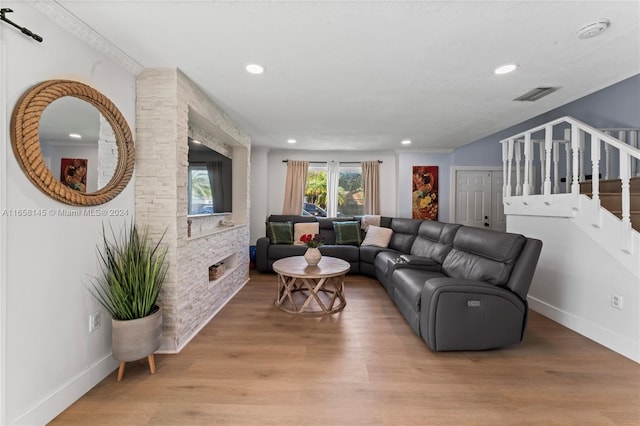 living room with light hardwood / wood-style flooring