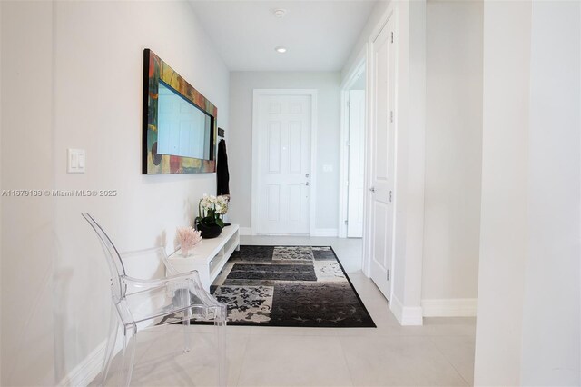 4527 Blessed Place Dr, Oakland Park, FL 33309 - corridor featuring baseboards, tile patterned flooring, and recessed lighting