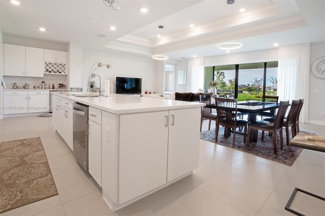 4527 Blessed Place Dr, Oakland Park, FL 33309 - kitchen with a sink, a raised ceiling, ornamental molding, stainless steel dishwasher, and backsplash