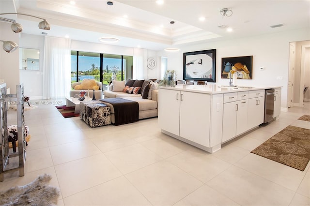 4527 Blessed Place Dr, Oakland Park, FL 33309 - living room with a raised ceiling, ornamental molding, light tile patterned floors, and recessed lighting
