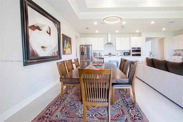 4527 Blessed Place Dr, Oakland Park, FL 33309 - dining area featuring recessed lighting, baseboards, ornamental molding, and a raised ceiling