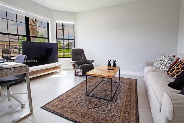 4527 Blessed Place Dr, Oakland Park, FL 33309 - living area with baseboards, an office area, and tile patterned floors