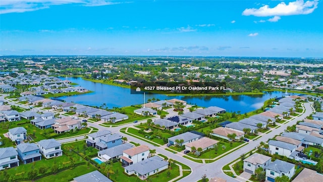 4527 Blessed Place Dr, Oakland Park, FL 33309 - aerial perspective of suburban area featuring a nearby body of water