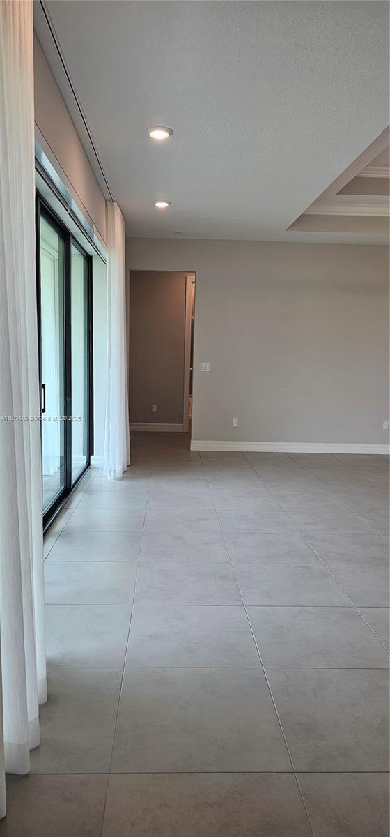 4527 Blessed Place Dr, Oakland Park, FL 33309 - unfurnished room featuring baseboards and recessed lighting