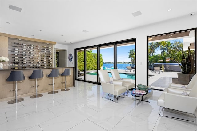 living room featuring a water view