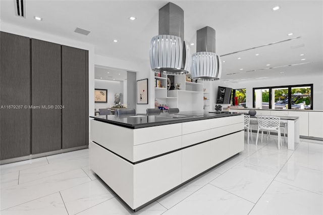 kitchen featuring white cabinetry