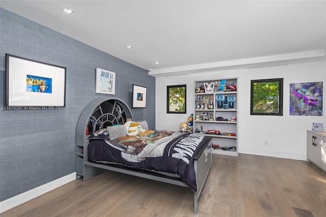 bedroom featuring wood-type flooring