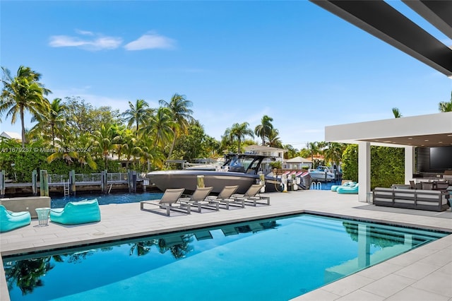 view of pool featuring an outdoor hangout area and a patio