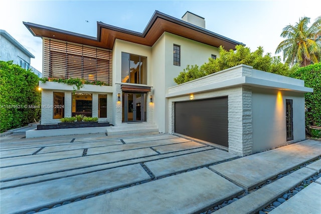 contemporary home featuring a garage