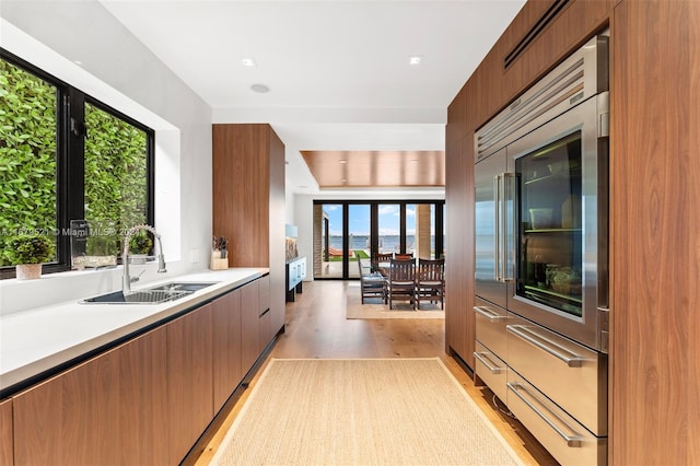 kitchen featuring sink and light hardwood / wood-style floors