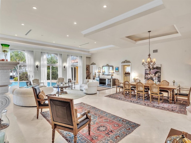449 Isle Of Palms Dr, Fort Lauderdale, FL 33301 - living area with a notable chandelier, a tray ceiling, recessed lighting, and visible vents