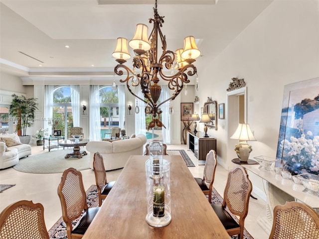 449 Isle Of Palms Dr, Fort Lauderdale, FL 33301 - dining room with ornamental molding and a chandelier