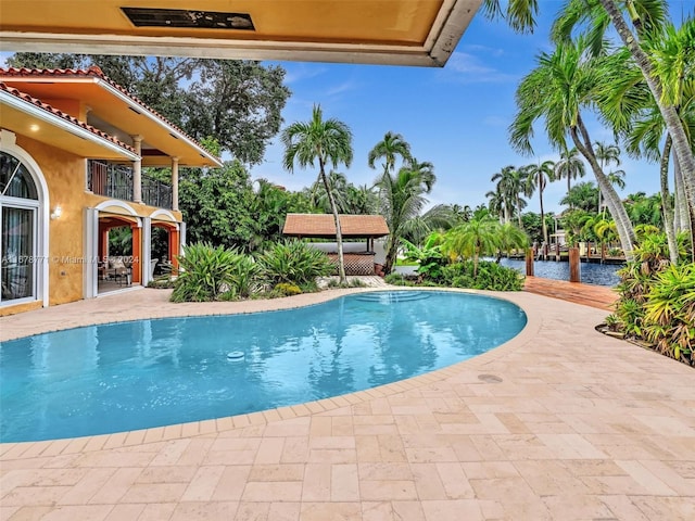 449 Isle Of Palms Dr, Fort Lauderdale, FL 33301 - outdoor pool with a water view and a patio area