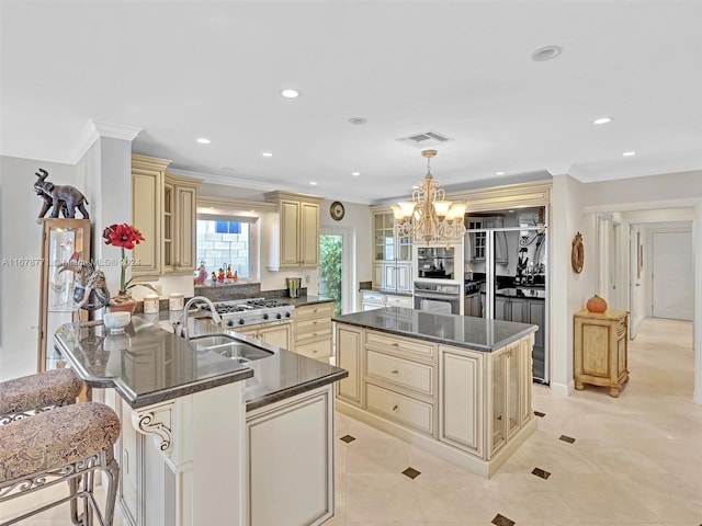 449 Isle Of Palms Dr, Fort Lauderdale, FL 33301 - kitchen with crown molding, cream cabinets, recessed lighting, and a notable chandelier