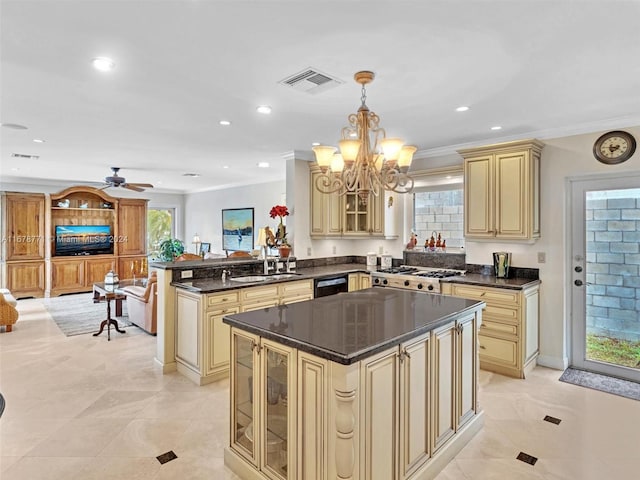 449 Isle Of Palms Dr, Fort Lauderdale, FL 33301 - kitchen featuring a sink, dishwasher, a peninsula, cream cabinetry, and visible vents
