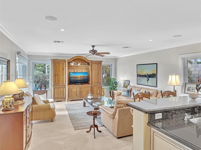 449 Isle Of Palms Dr, Fort Lauderdale, FL 33301 - living area with ceiling fan, visible vents, and ornamental molding