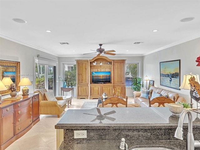 449 Isle Of Palms Dr, Fort Lauderdale, FL 33301 - living room with visible vents, a ceiling fan, light tile patterned floors, and a wealth of natural light
