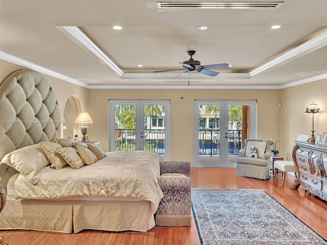 449 Isle Of Palms Dr, Fort Lauderdale, FL 33301 - bedroom with french doors, a raised ceiling, multiple windows, and access to exterior