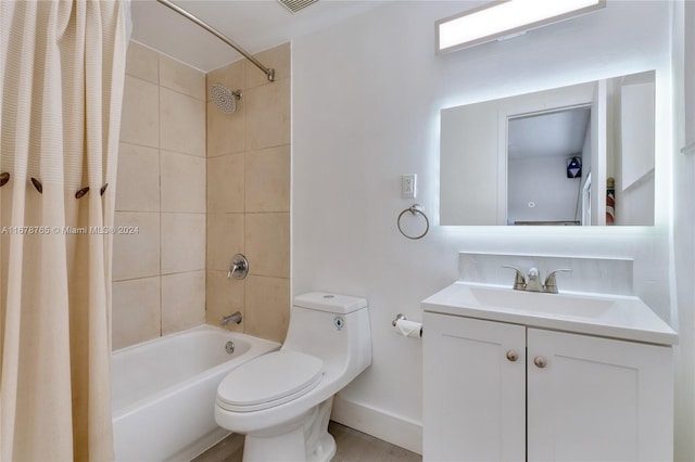 full bathroom with toilet, vanity, and shower / tub combo