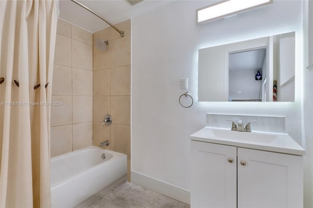 bathroom with vanity and shower / bath combination with curtain