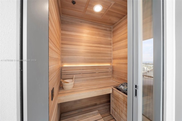 view of sauna / steam room featuring wooden ceiling