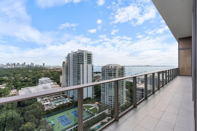 balcony featuring a water view