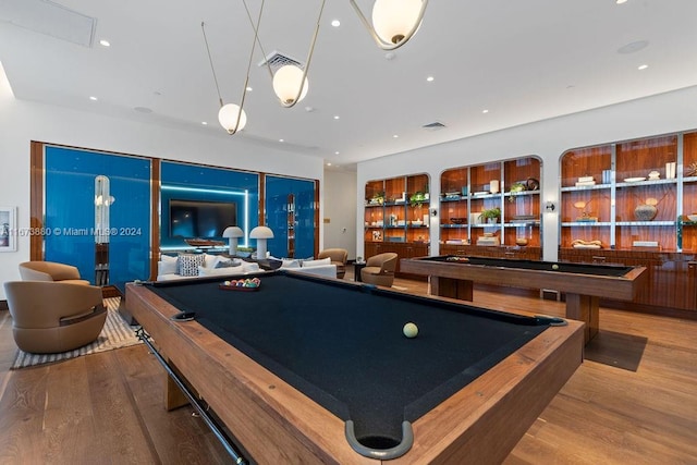 playroom with wood-type flooring and pool table